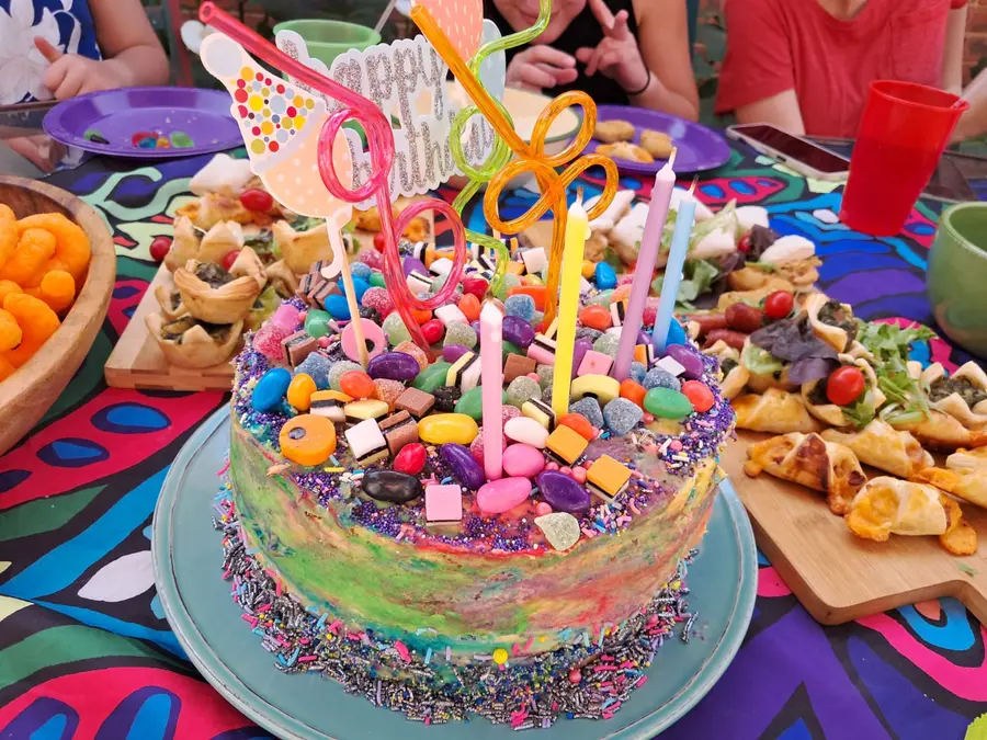 Colourful party cake on a celebration table