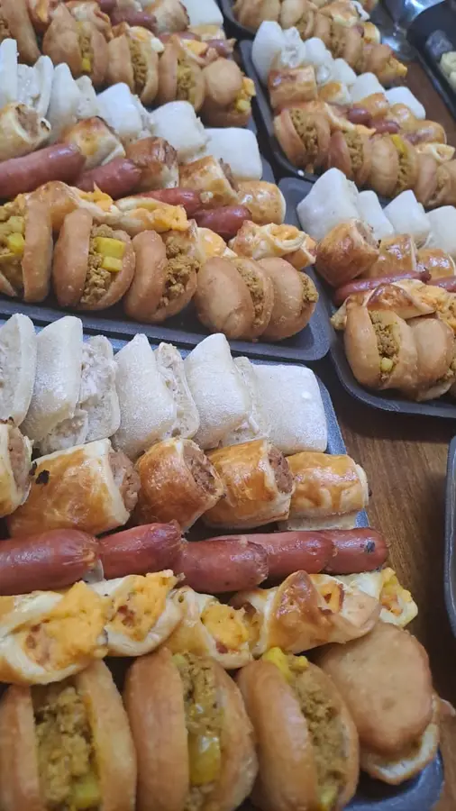Savoury catering platter with sausage rolls and filled bites