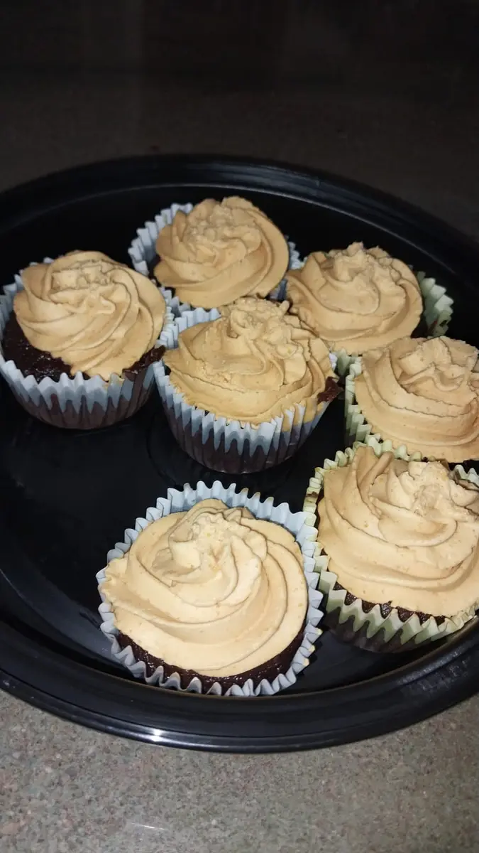 Chocolate cupcakes with caramel-toned frosting